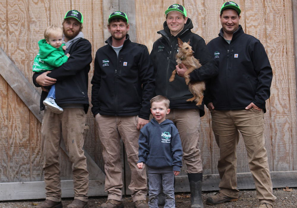 aboutme2 Members of the Nate O'Grady team and their families posing for a picture