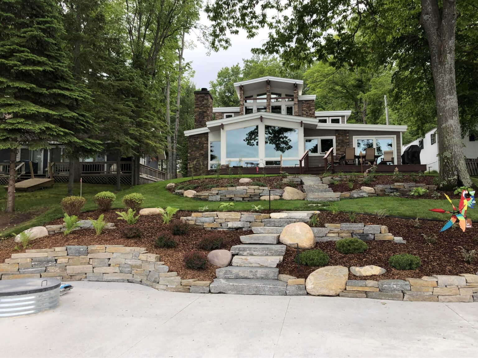 gallery-scaled Terraced yard with mulched area and small shrubs in northern Michigan